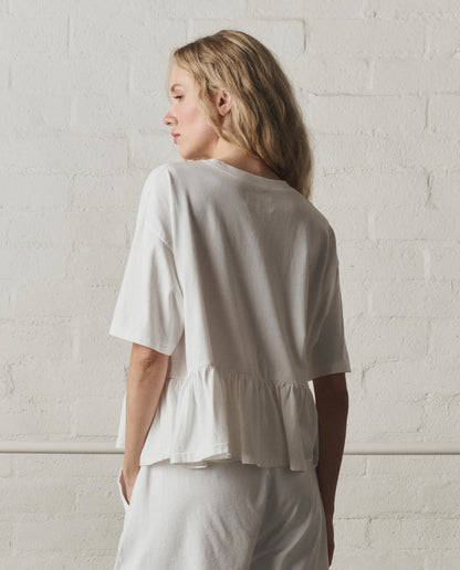 The Oversized Ruffle Peplum Tee. -- True White
