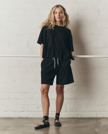 The Oversized Ruffle Peplum Tee. -- True Black